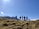 A group of travelers enjoying a scenic outdoor adventure together.