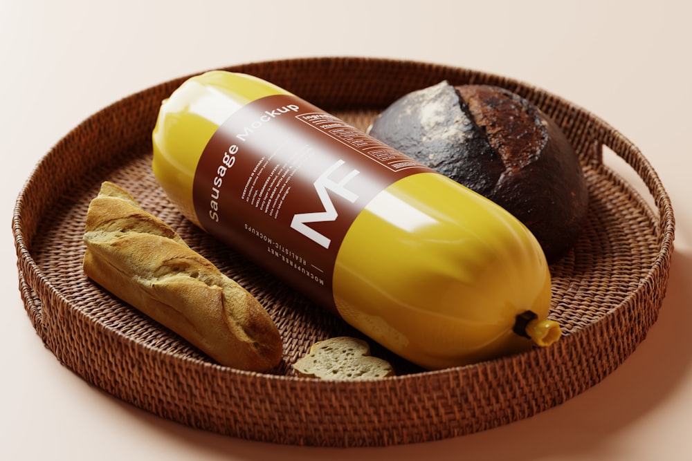 a bottle of sunscreen next to a pastry on a plate