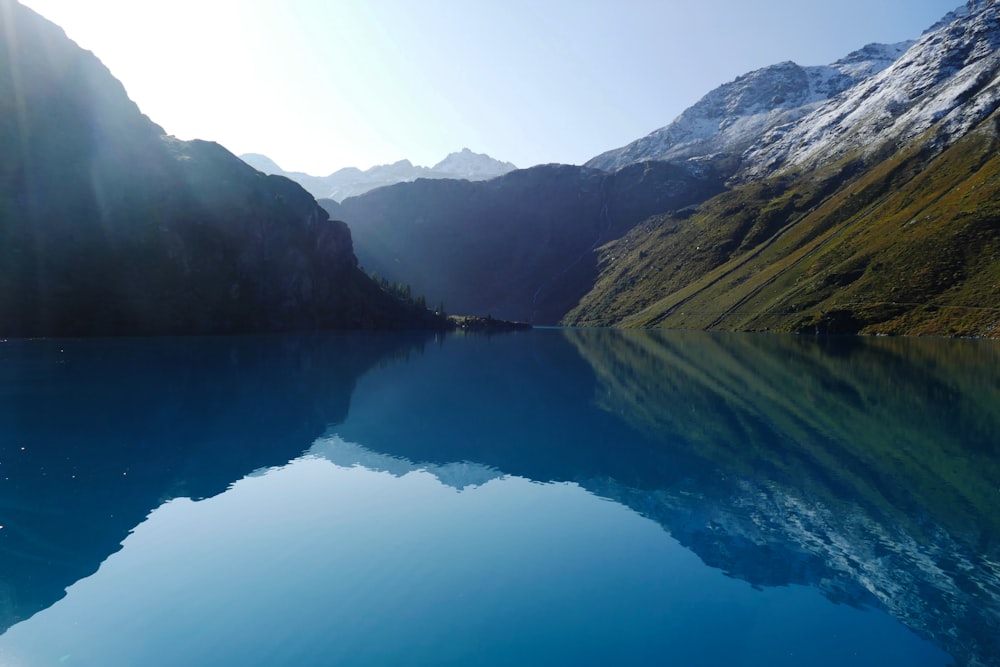 a large body of water surrounded by mountains