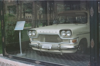 A vintage car showcased at an automotive exhibition.