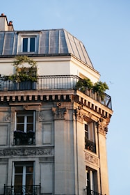 a tall building with a balcony and balconies