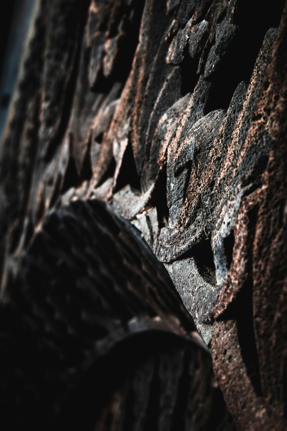 a close up of a rusted metal object