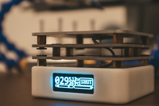 A close-up of a radon detection device on a table.