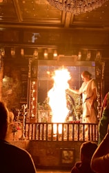 Healer Ayyan performing a sacred ritual surrounded by natural elements and spiritual symbols.