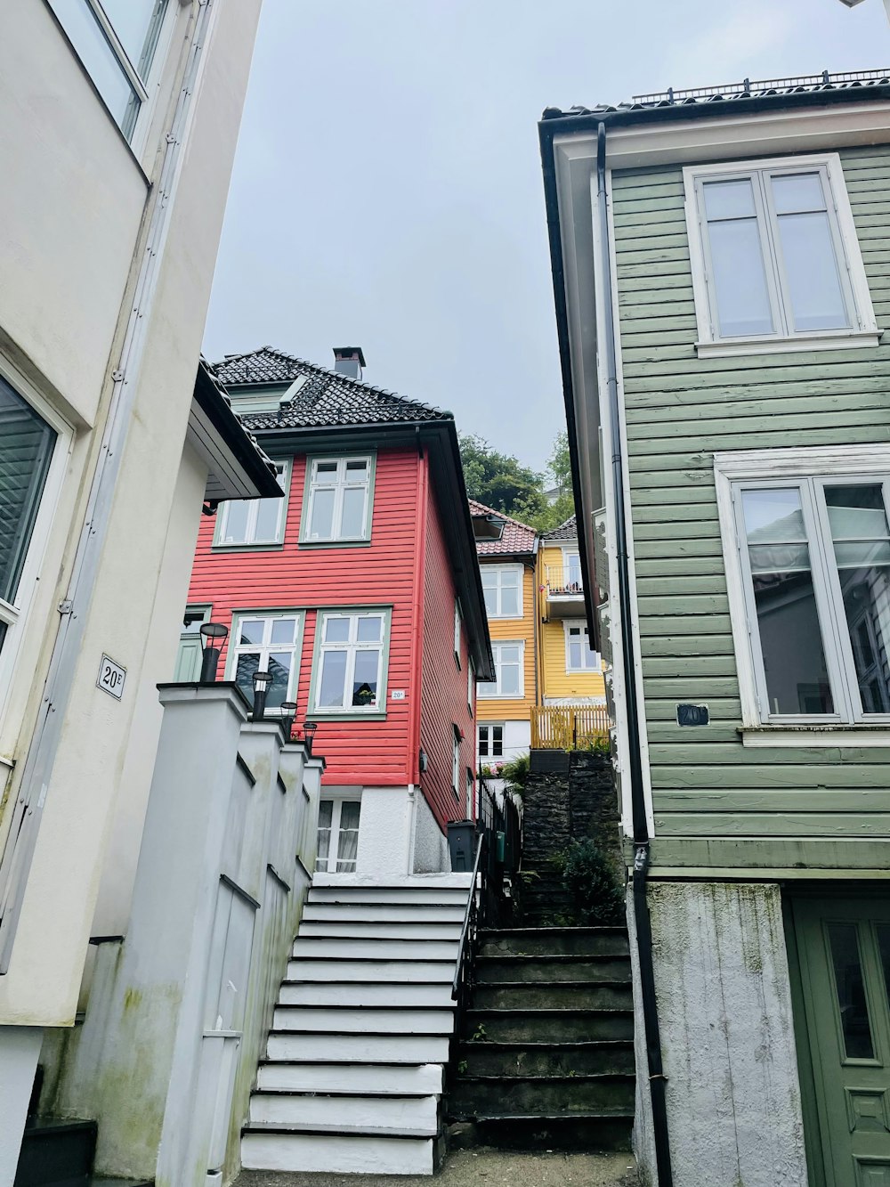 a group of buildings with stairs leading up to them