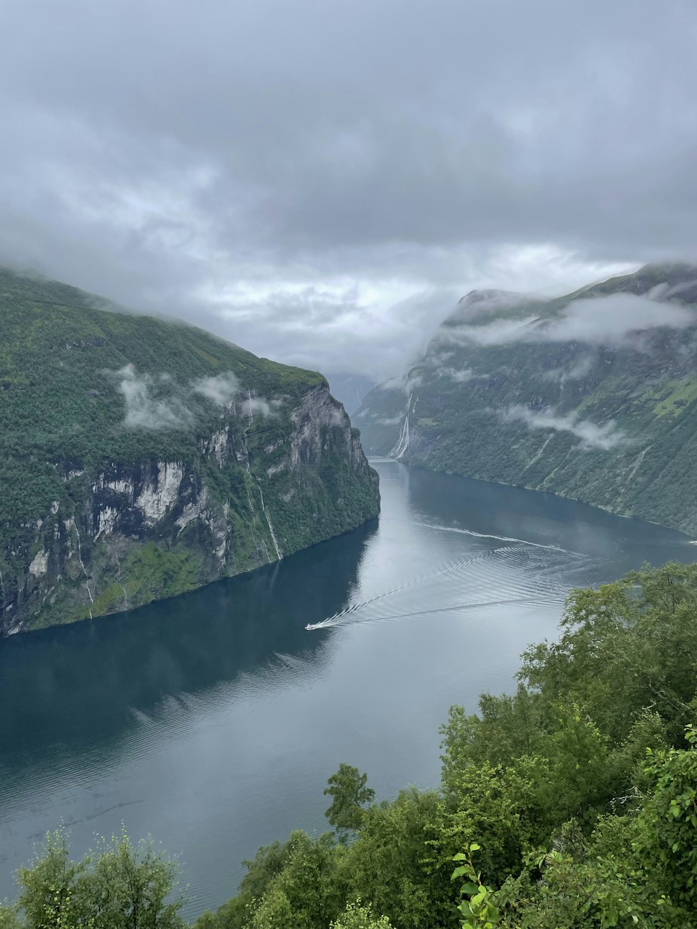 a large body of water surrounded by mountains