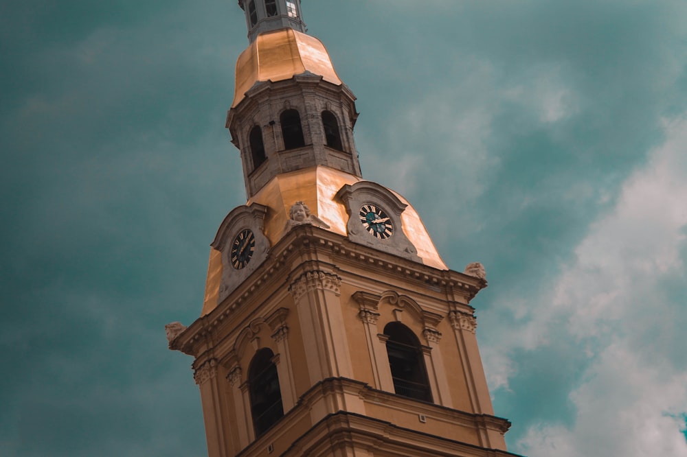 a tall clock tower with a sky background