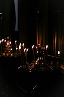 Soft candlelight illuminating a quiet moment of reflection after a Sufi Flow session.