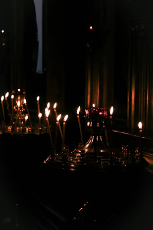 Softly lit candles and incense creating a calming atmosphere for emotional reflection.