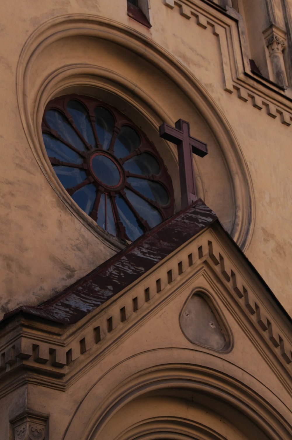 a church with a cross on the top of it