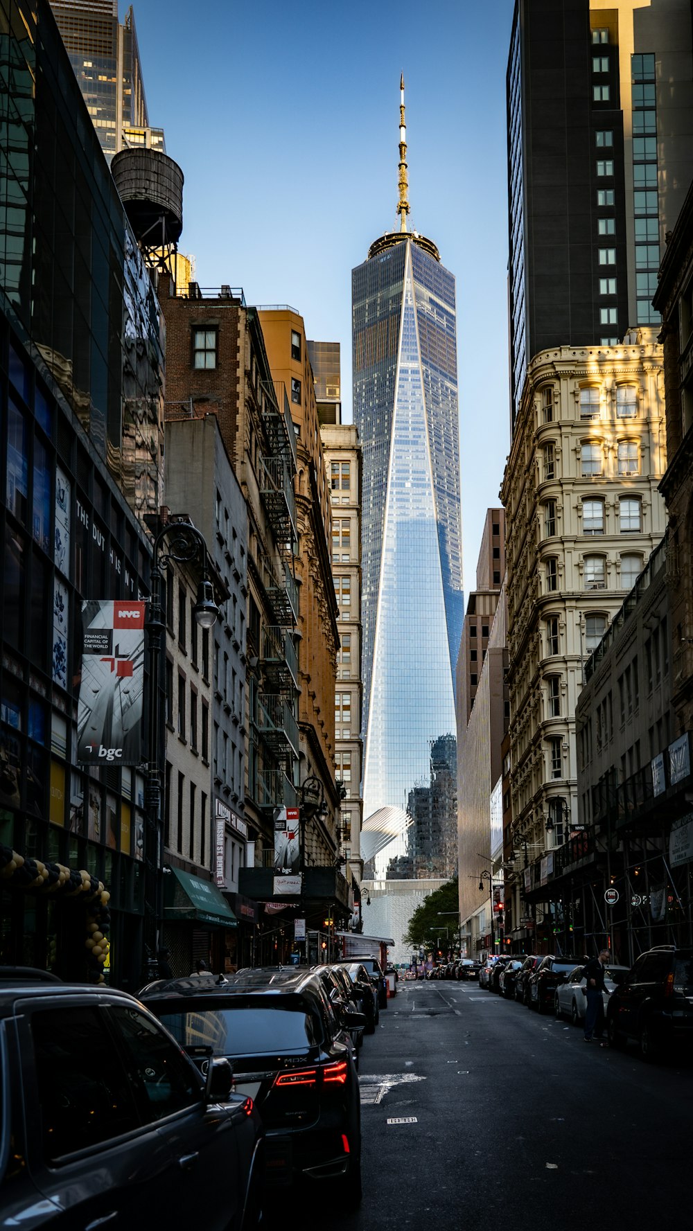 a very tall building towering over a city