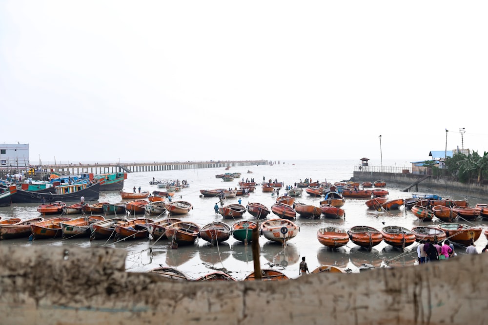 a bunch of boats that are sitting in the water