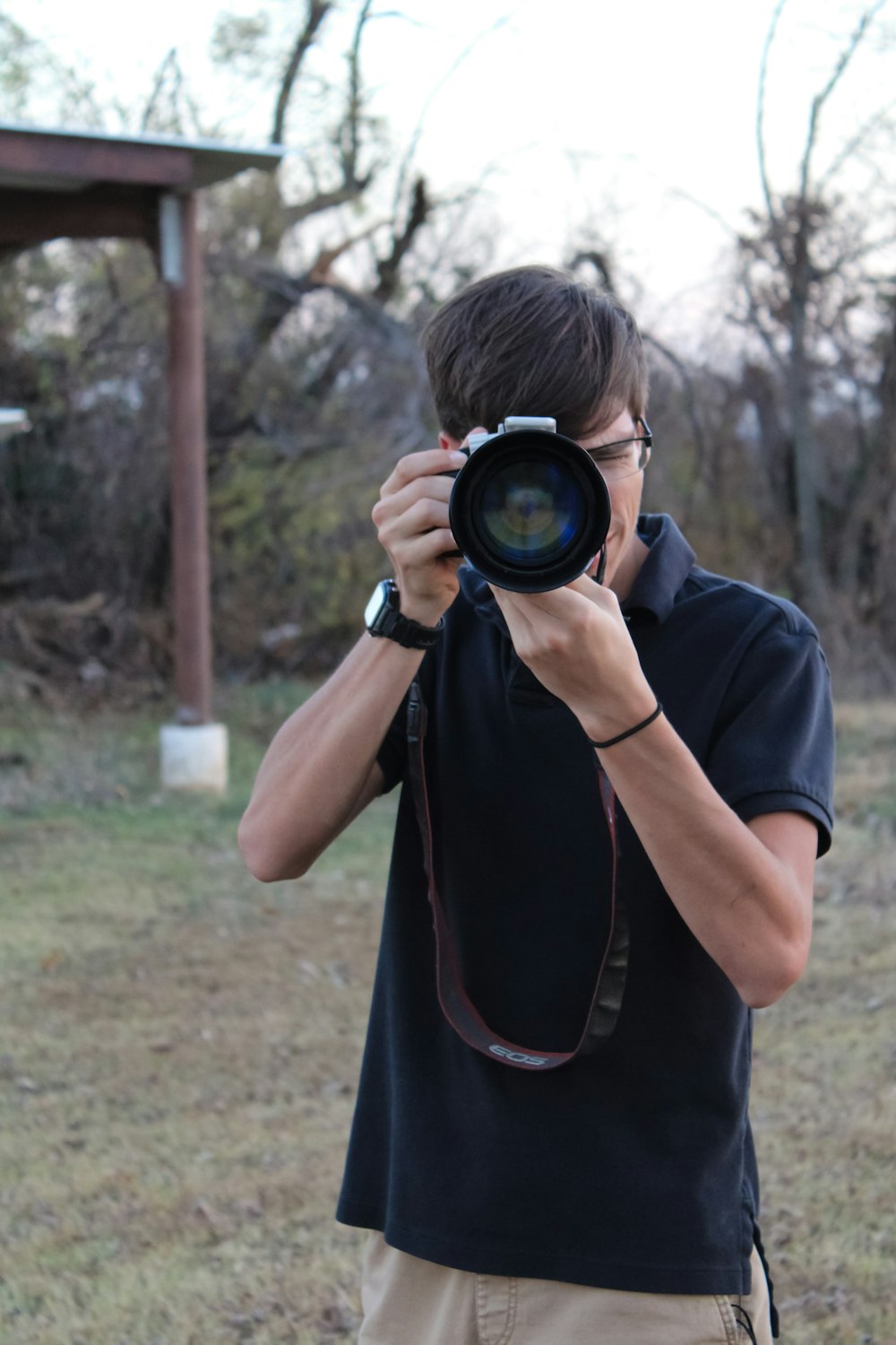 a man taking a picture of himself with a camera