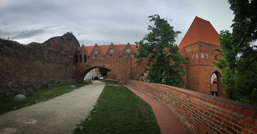 Historic Toruń brick castle and walkway