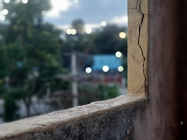 Before and after photos showing renovated interior window sills with fresh, clean finishes.
