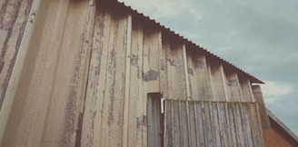 a building with a metal roof and a metal door