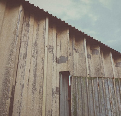 a building with a metal roof and a metal door