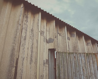 a building with a metal roof and a metal door