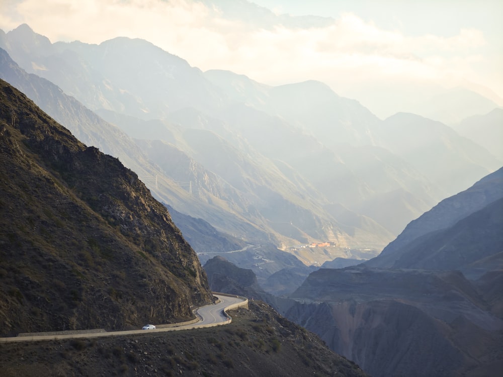 a car driving down a winding mountain road