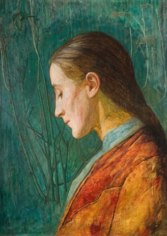 A warm, inviting portrait of Nidhira Nerkaar surrounded by vibrant green, red, and yellow hues.