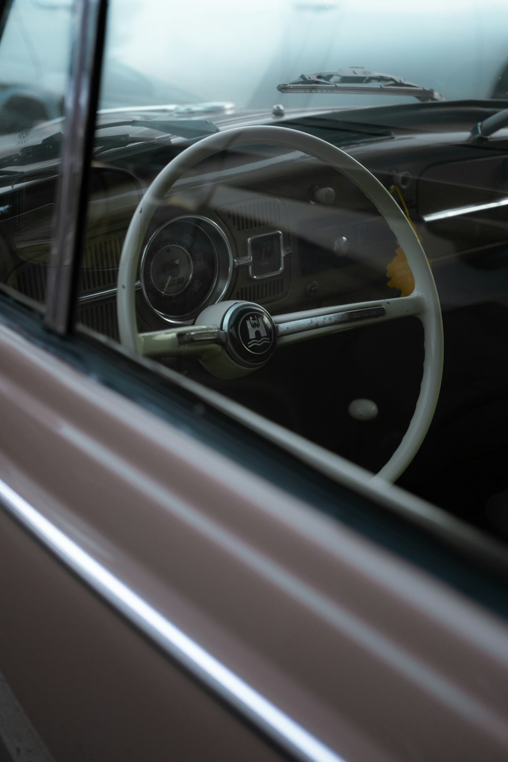 the interior of a car with a steering wheel