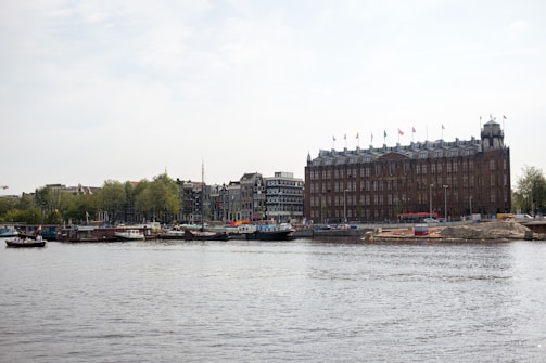 Office building with maritime flags near a harbor