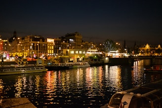 a harbor filled with lots of boats at night