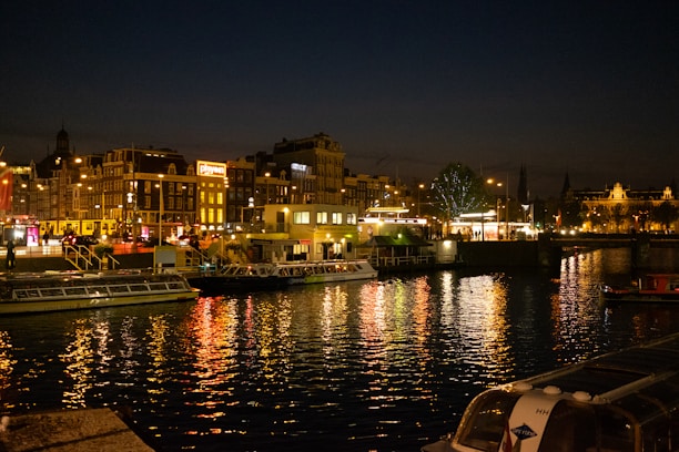 a harbor filled with lots of boats at night