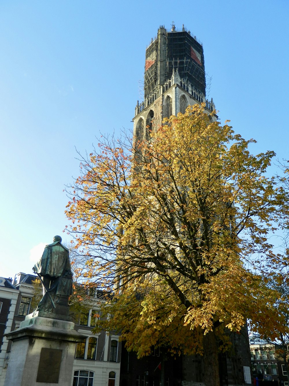 a tall tower with a clock on the top of it