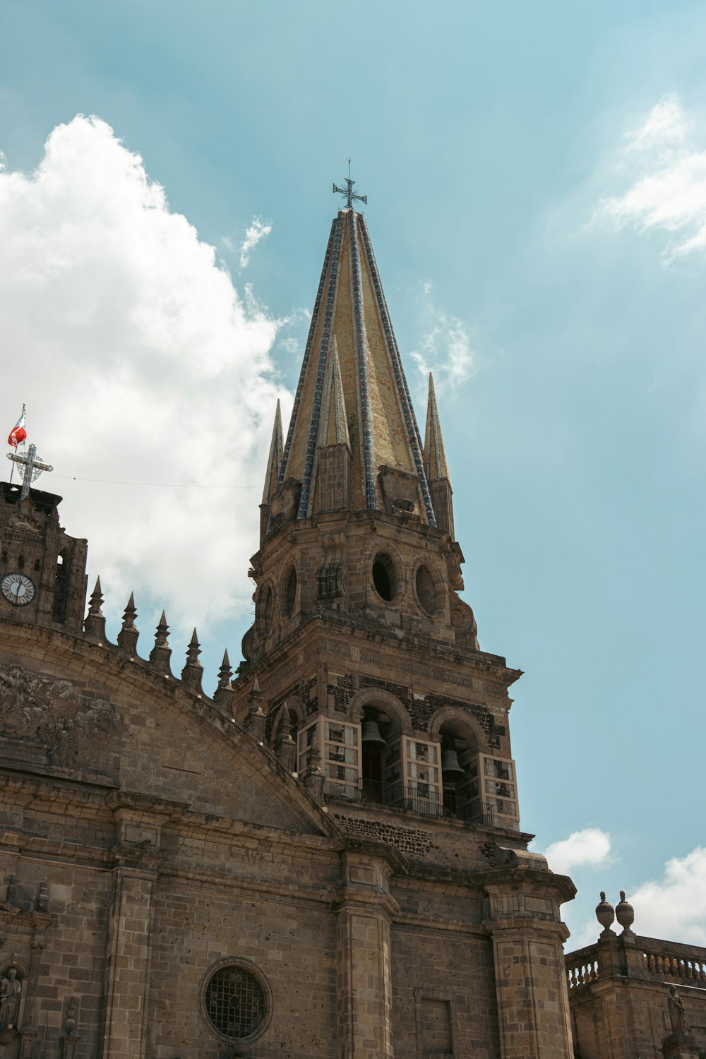 a tall building with a clock on the top of it