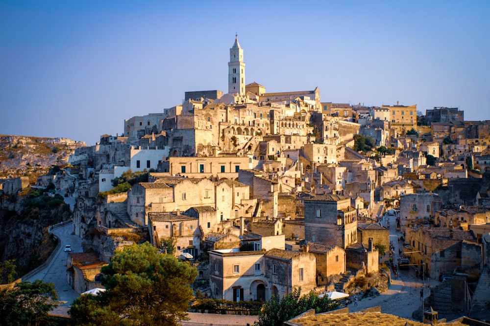 a large city with a tall tower on top of it