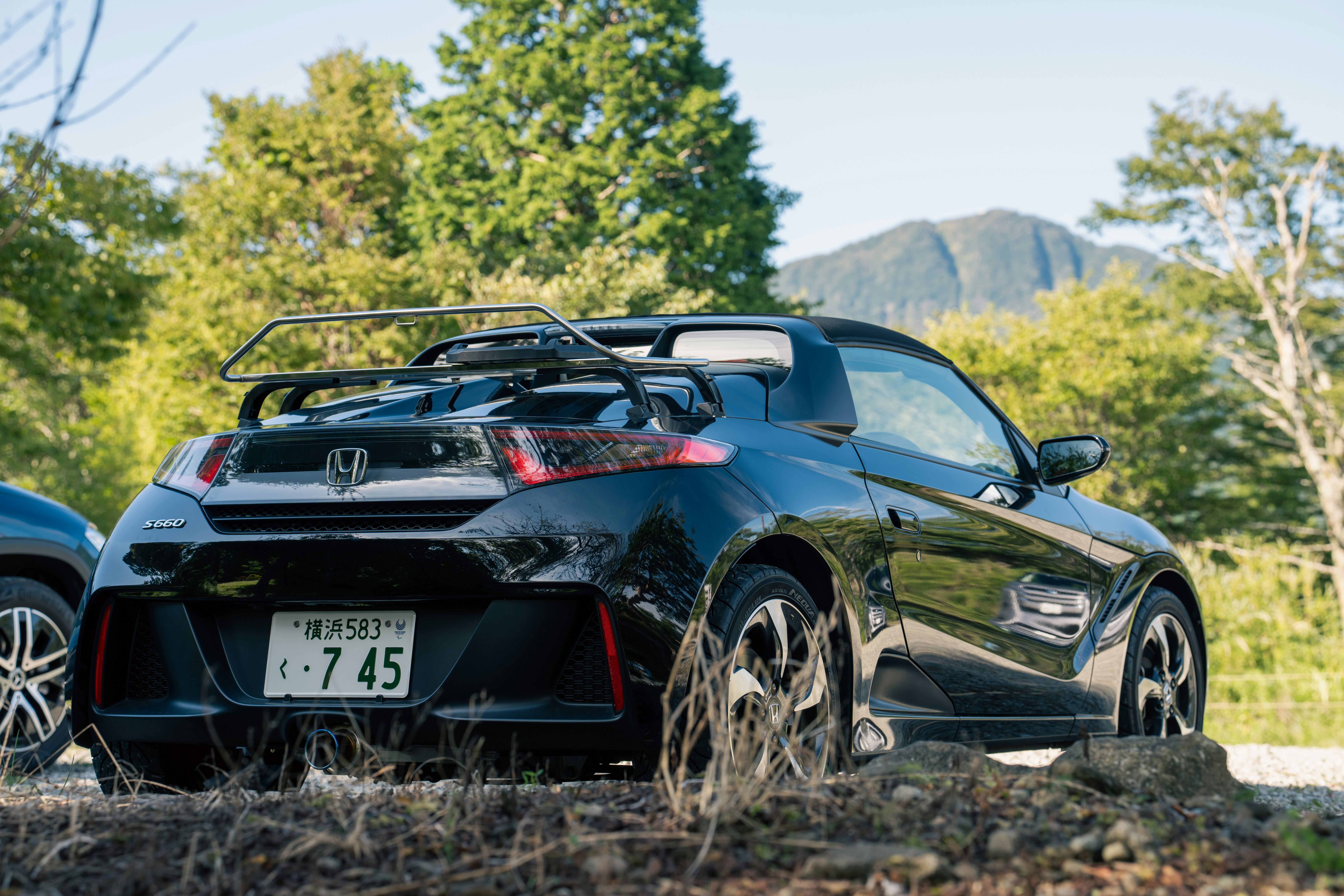 Toyota bZ4X electric SUV plugged into a public charging station