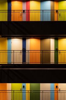 A collage of hostel facades showcasing diverse styles and welcoming entrances.