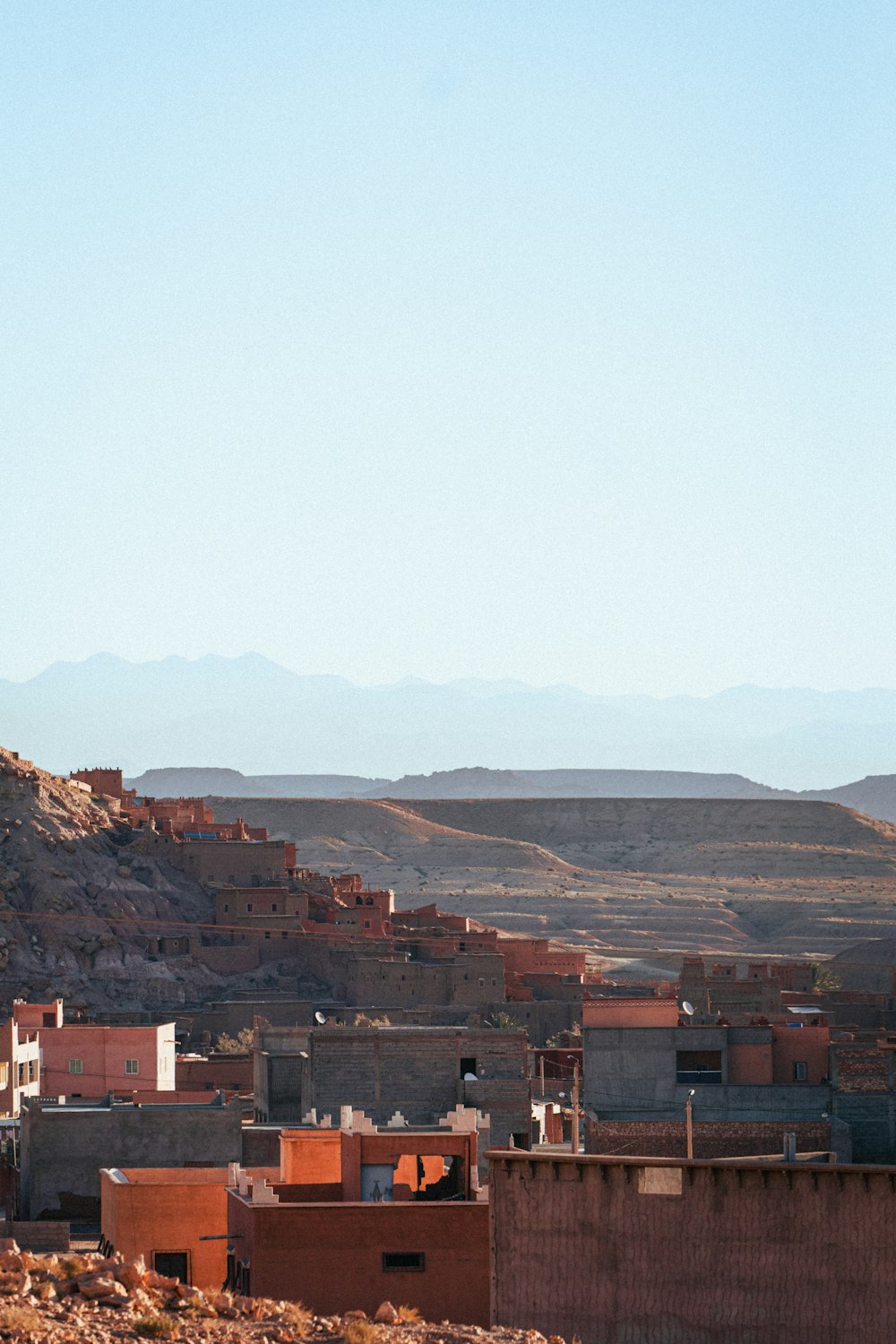 a view of a small town in the middle of the desert