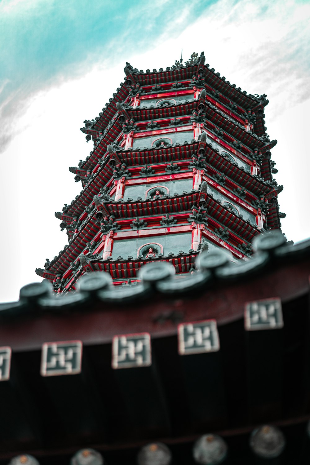 a tall tower with a sky in the background