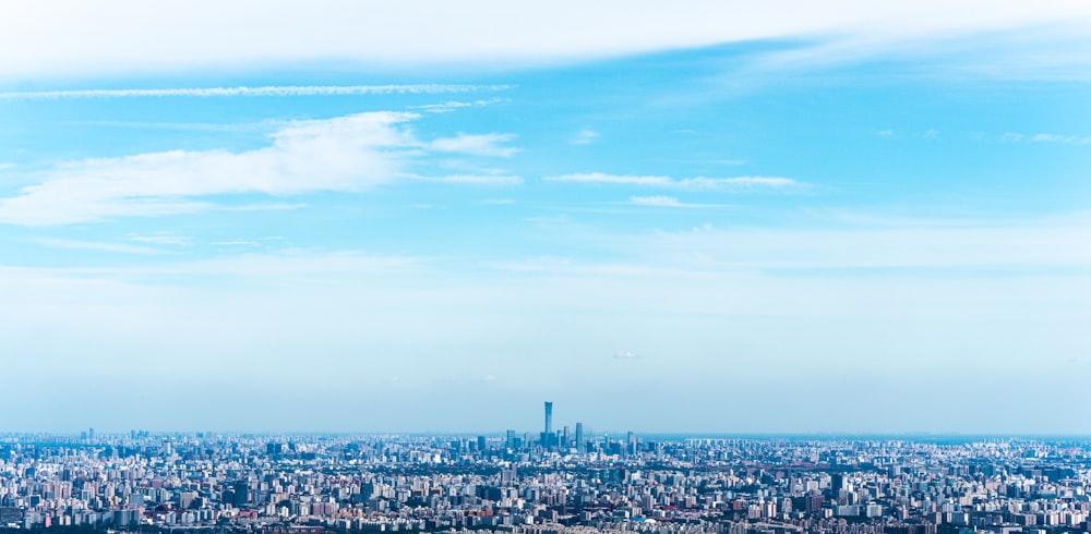 a view of a city from the top of a hill