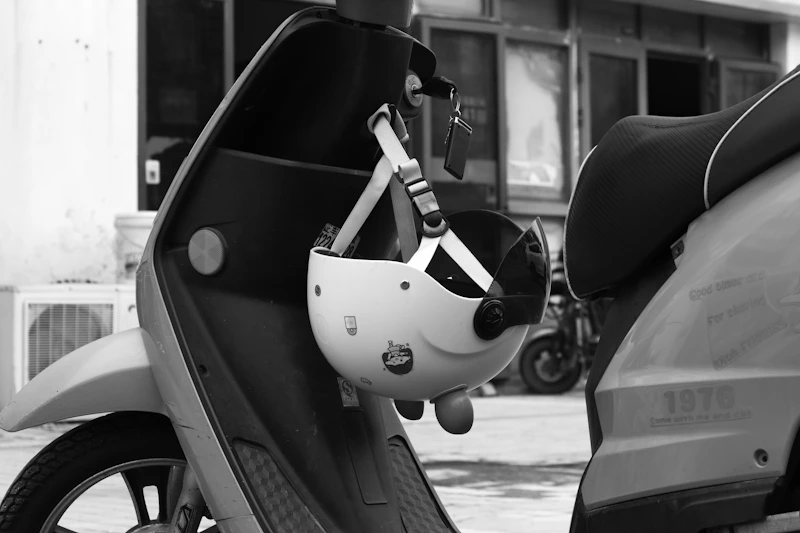 Helmet attached to a parked scooter