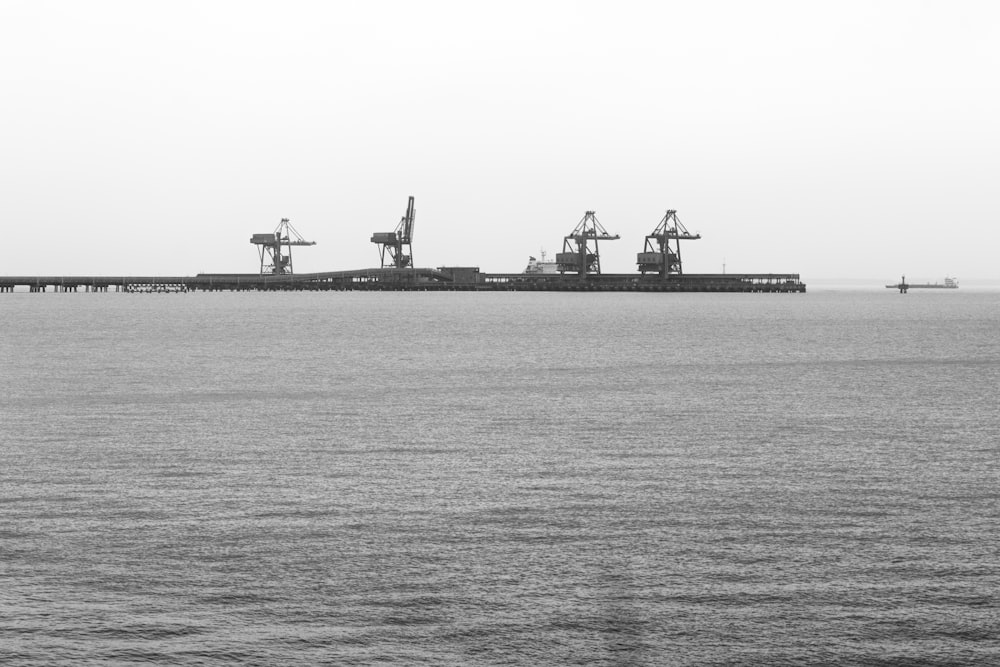 a black and white photo of a large body of water