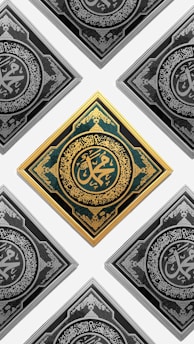 a set of four arabic calligraphys on a white background