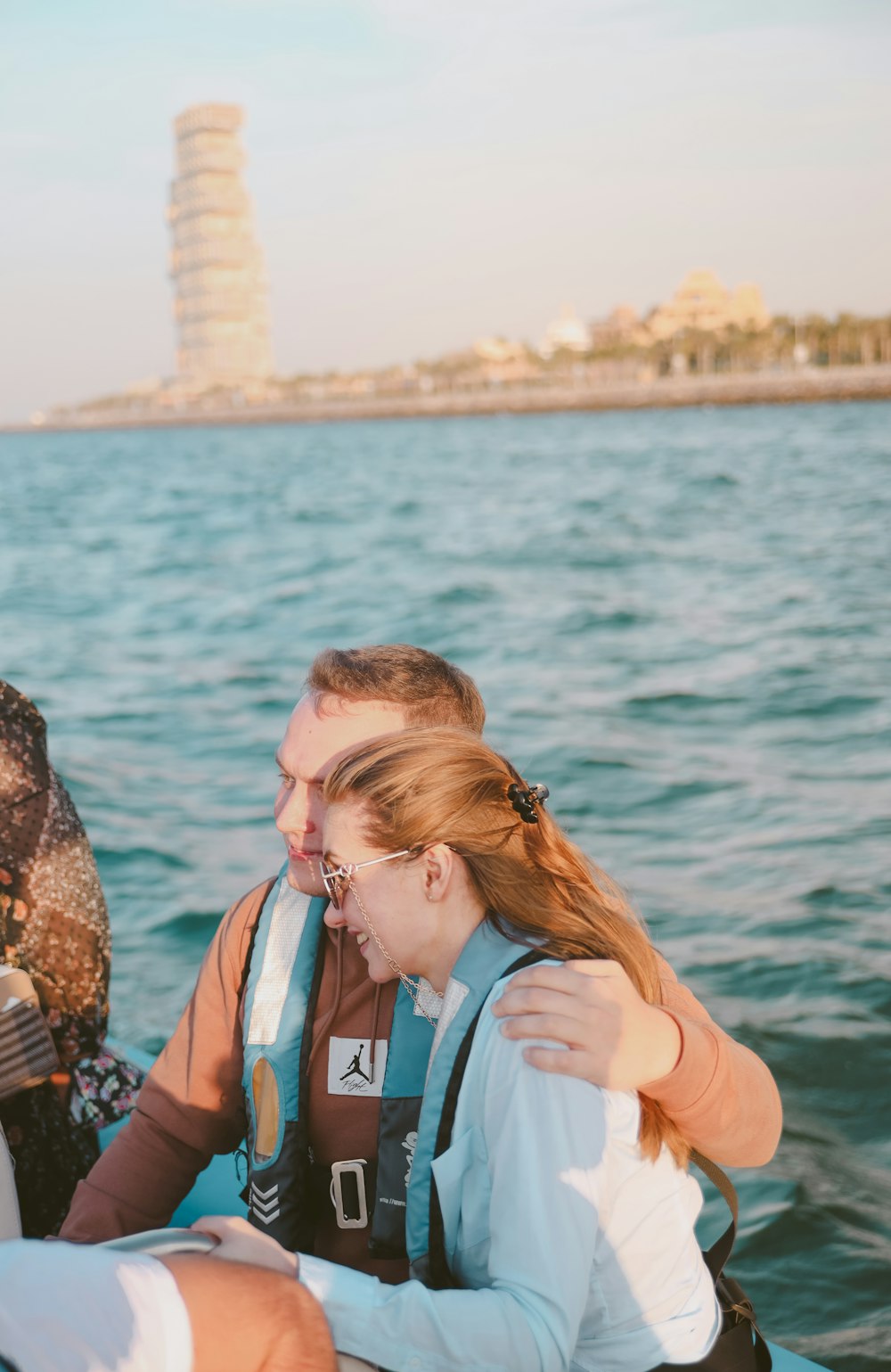 a group of people riding on the back of a boat