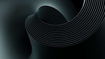 an abstract black and white background with curved lines