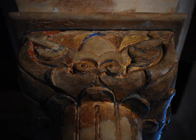 Ornate decorative pier cap with intricate patterns.