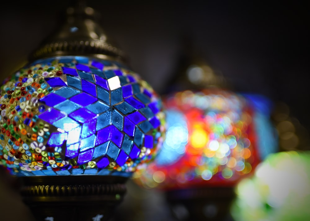 a close up of a colorful lamp on a table