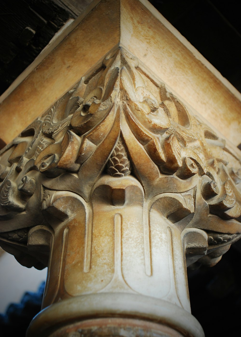 a close up of a pillar with a decorative design