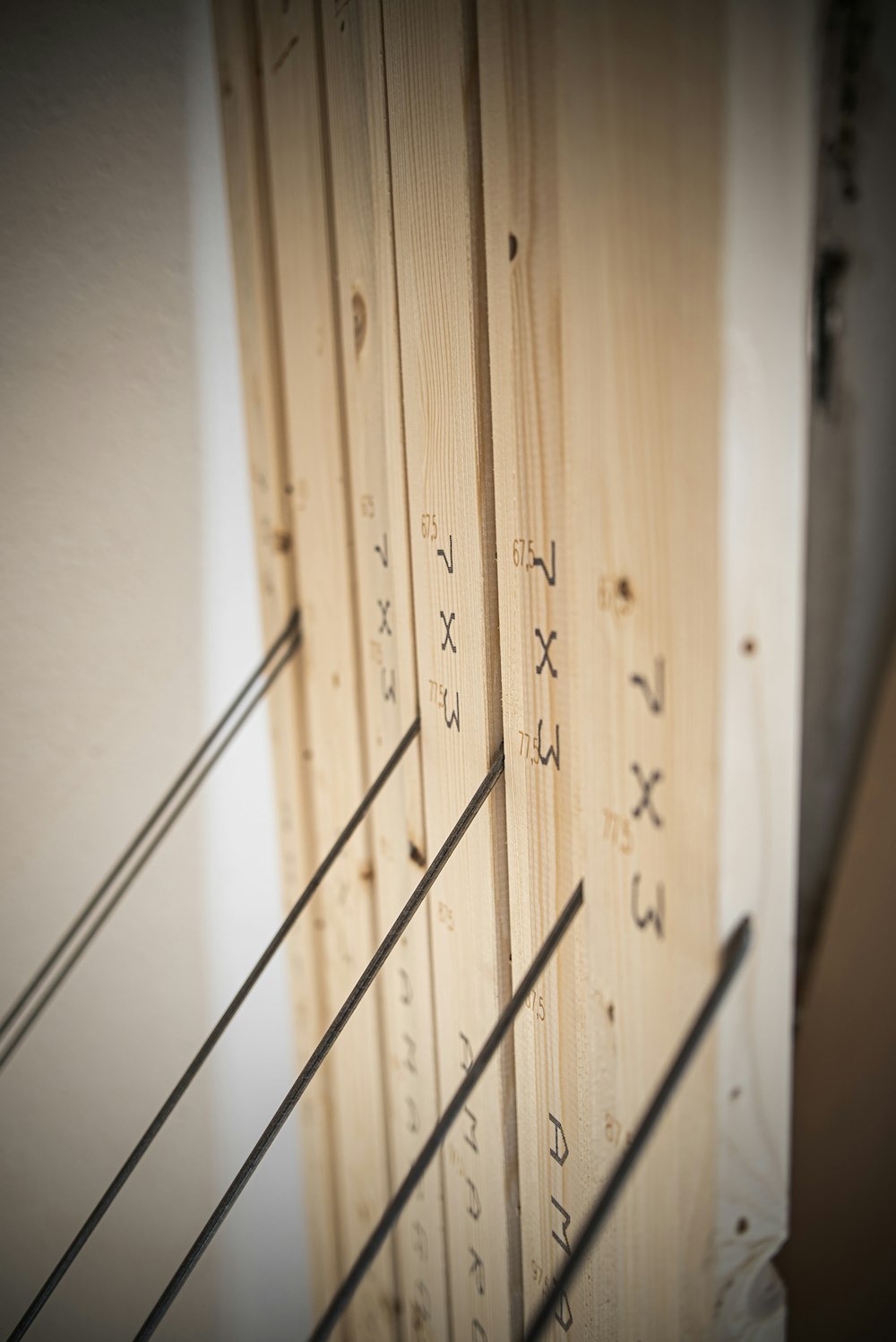 a close up of a wooden wall with writing on it