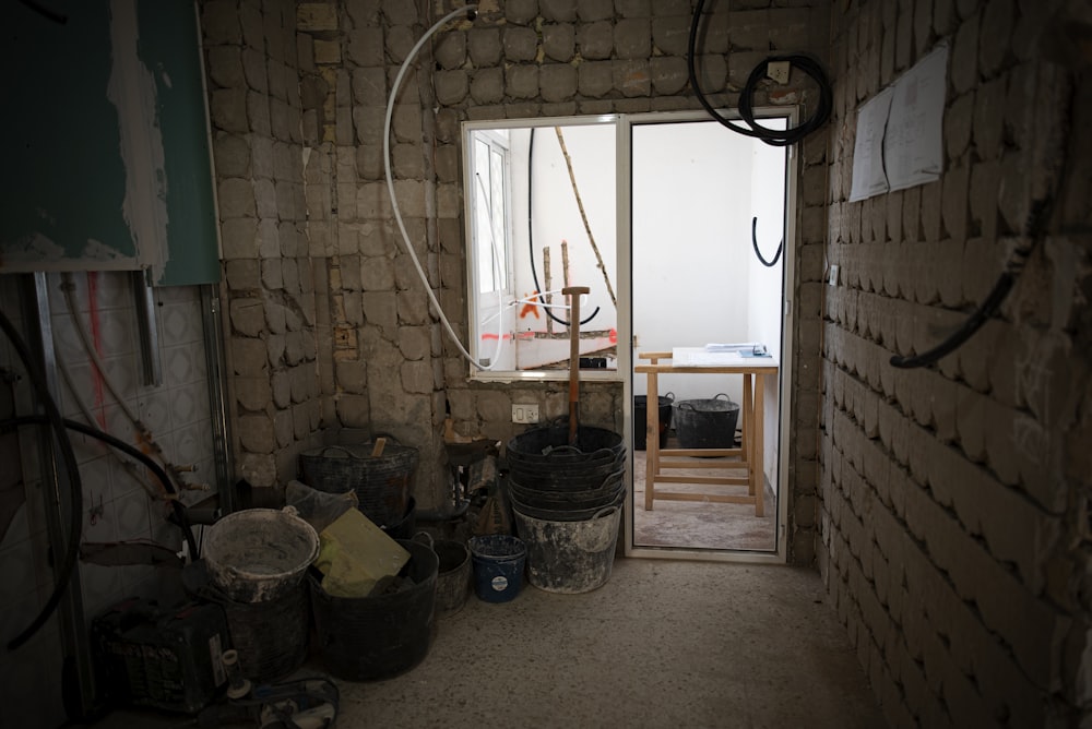 a room that has a bunch of buckets in it