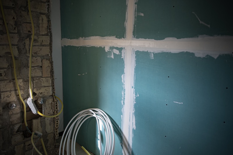 Room wall with complete replastering in progress