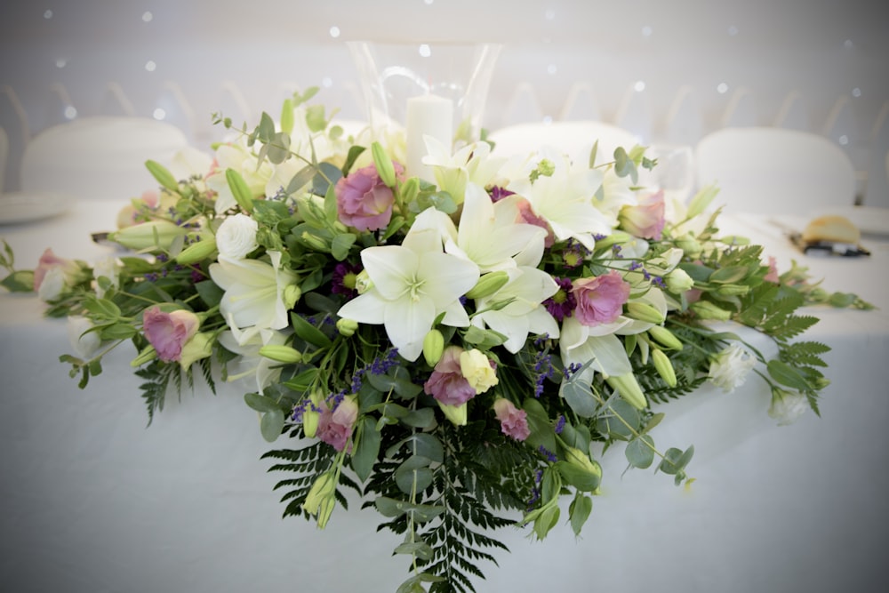 a bouquet of flowers sitting on top of a table