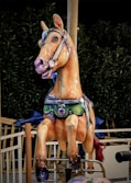 a merry go round horse on a merry go round ride