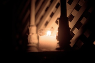 Marble candle holder casting soft shadows in warm light